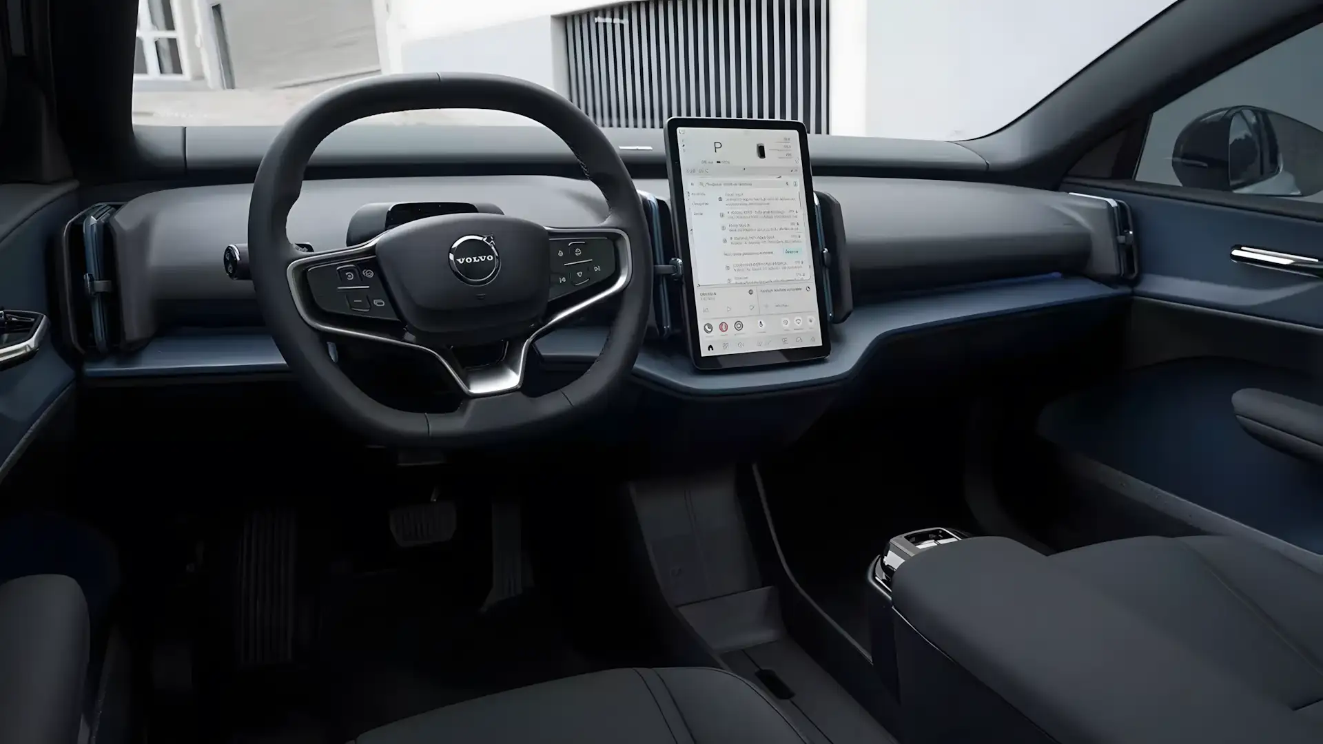 Painel do Volvo EX30 2026 com tela vertical de 12,3 polegadas e sistema Google integrado.