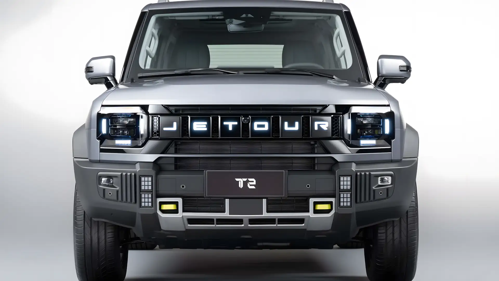 Jetour T2 2026 visto de frente mostrando grade iluminada e design quadrado estilo off-road