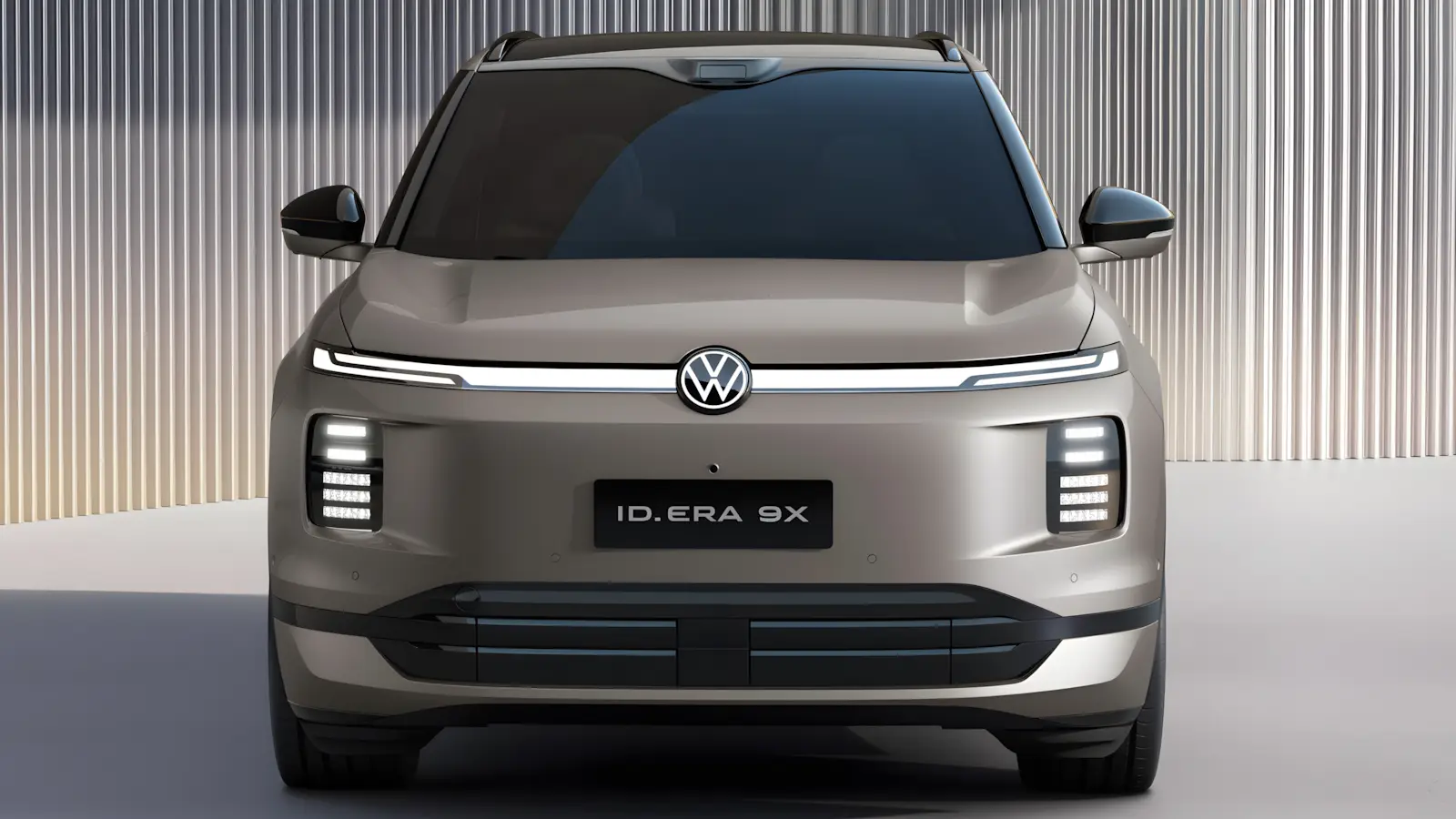 VW ID.Era 9X vista frontal mostrando far&oacute;is Matrix LED e design futurista