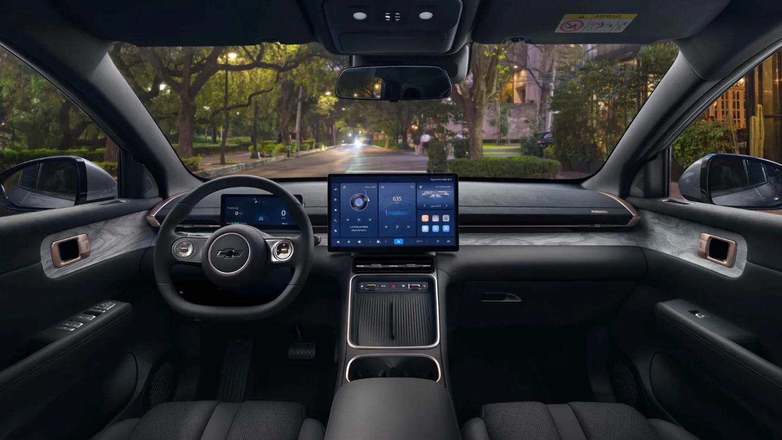 Interior do Chevrolet Captiva EV 2026 com a central multim&iacute;dia vertical de 15,6 polegadas e painel digital